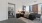 carpeted bedroom with city views