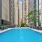 a swimming pool in a courtyard between buildings