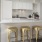a kitchen with stools at open countertop