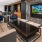 clubroom with a tv and couches